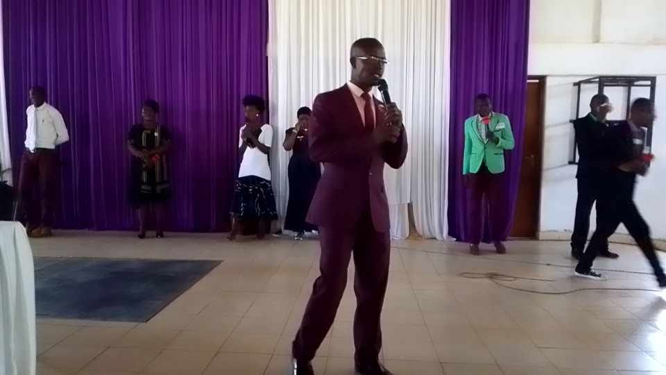 Bishop Sam Ministering